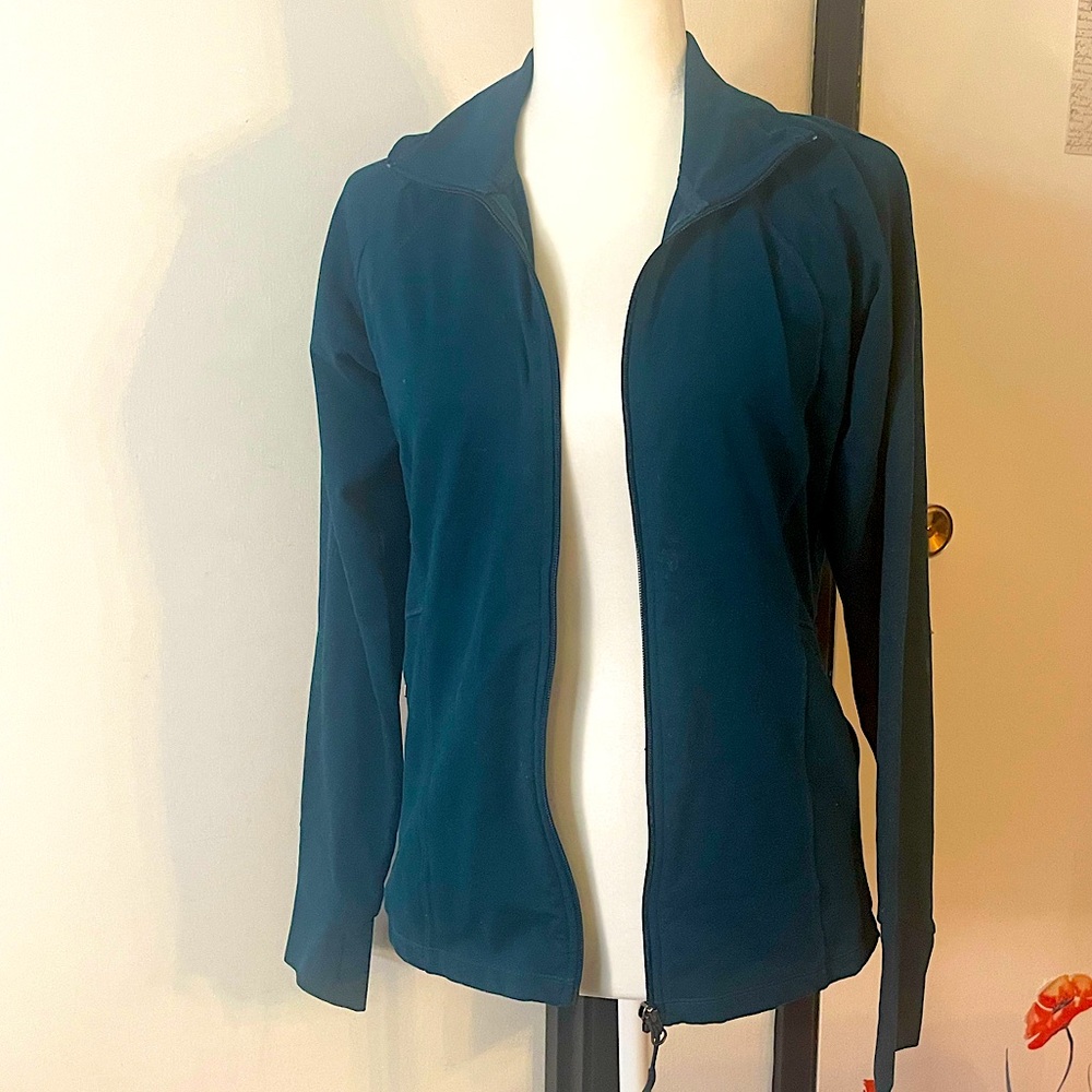 Teal zip up warm up jacket with sheer spine and pockets